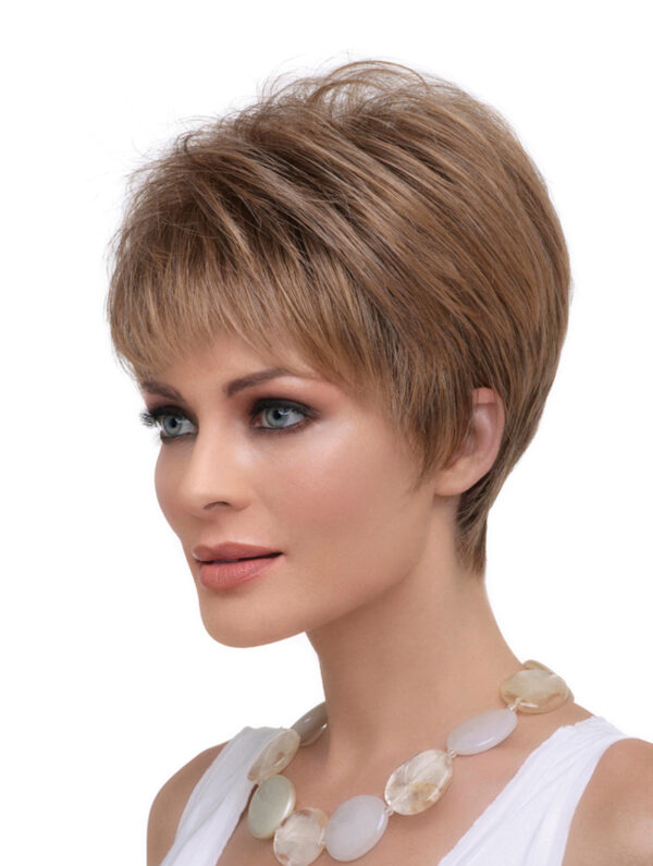 headshot of model wearing strawberry blonde pixie style wig